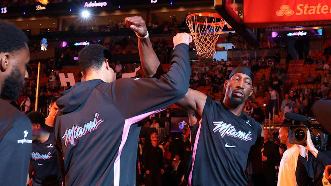  Mar 30, 2026; Miami, Florida, USA; Miami Heat center Bam Adebayo (13) and center Kel'el Ware (7) lock arms during player introductions before the game against the Philadelphia 76ers at Kaseya Center. Mandatory Credit: Sam Navarro-Imagn Images | Sam Navarro-Imagn Images 