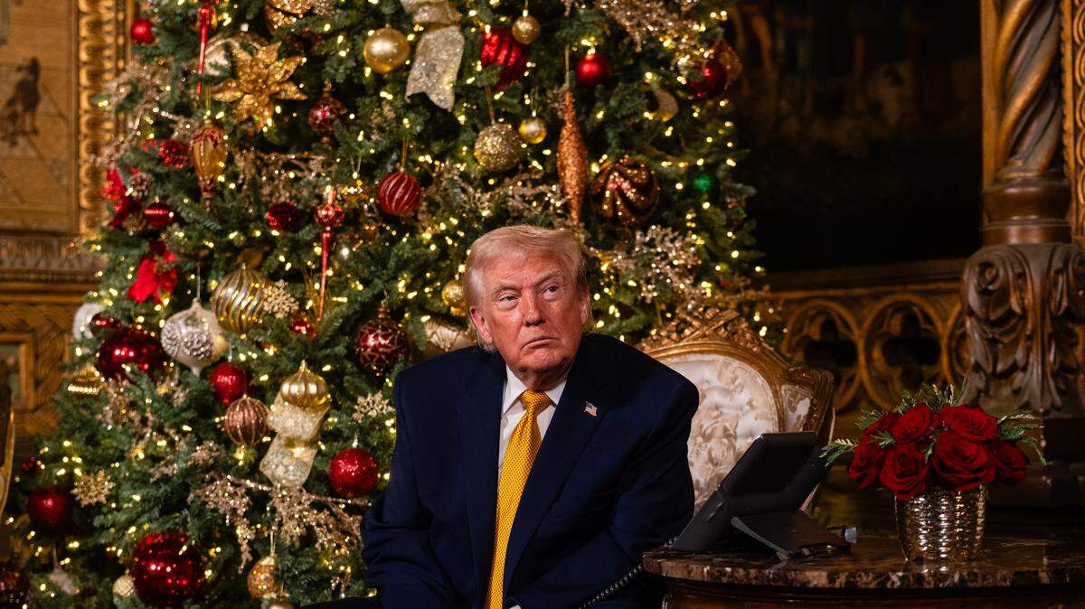 President Donald Trump takes part in NORAD Santa Calls and calls with service members on Christmas Eve at Mar-a-Lago in Palm Beach, Fla., Wednesday.