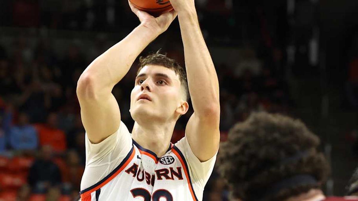  Jan 17, 2026; Auburn, Alabama, USA; Auburn Tigers forward Filip Jovic (38) shoots a free throw during the second half against the South Carolina Gamecocks at Neville Arena. Mandatory Credit: John Reed-Imagn Images | John Reed-Imagn Images 