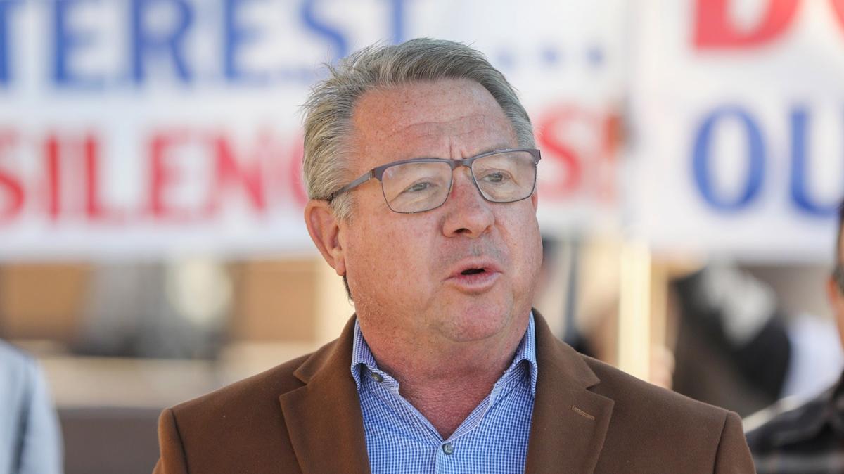 El Cajon Mayor Bill Wells stands along with other community leaders in opposition to a proposal to redraw San Diego's voting districts while speaking at El Cajon City Hall on Dec. 8, 2021, in El Cajon, California. (Eduardo Contreras/The San Diego Union-Tribune/TNS)