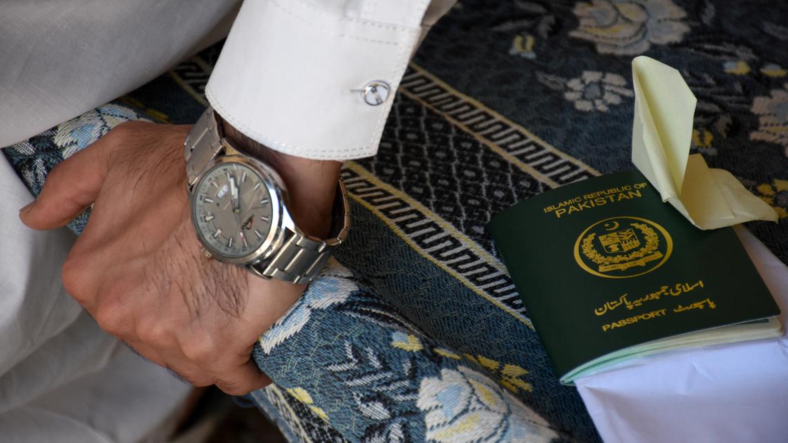 Pakistan Shi'ites deported from UAE return to lost jobs, frozen savings 
