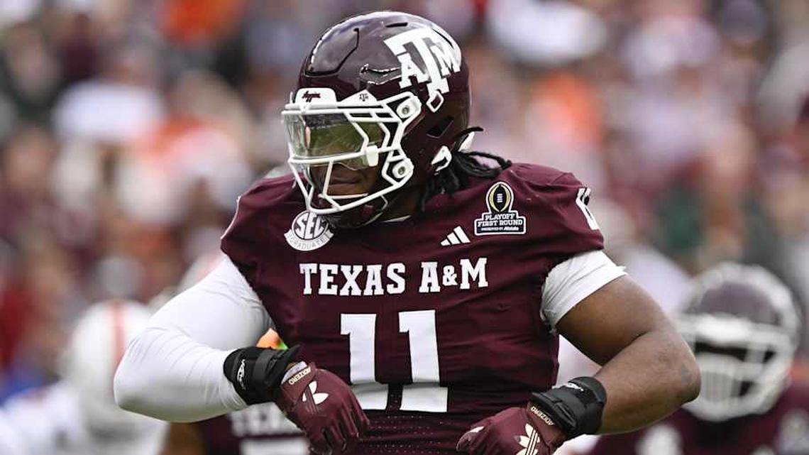  Dec 20, 2025; College Station, TX, USA; Texas A&M Aggies defensive tackle Tyler Onyedim (11) celebrates a sack during first half of the first round game of the CFP National Playoff against the Miami Hurricanes at Kyle Field. Mandatory Credit: Jerome Miron-Imagn Images | Jerome Miron-Imagn Images 