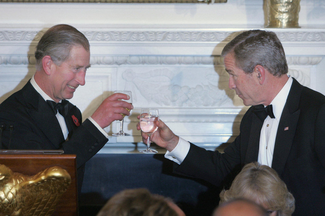  The Prince of Wales, left, toasts President George W. Bush during a social dinner on 2 November, 2005, at the White House in Washington, D.C. 