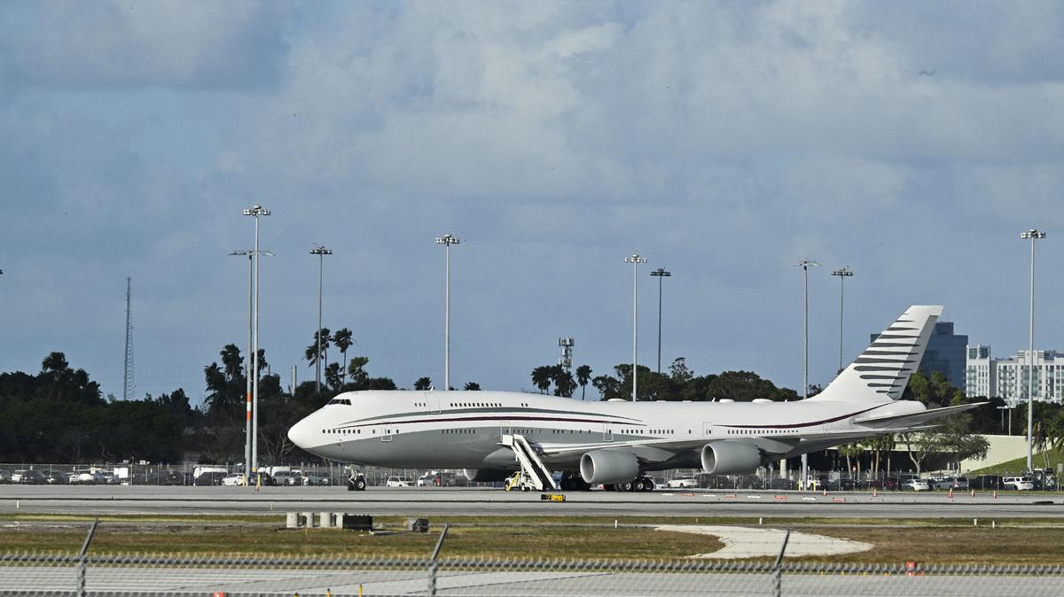 A Boeing 747 sits on the tarmac of Palm Beach International airport, after President Donald Trump toured the aircraft on Feb. 15, 2025. Donald Trump accepted the luxury Boeing jet from the Qatari royal family for use as Air Force One and then continue flying in it after his tenure, despite strict rules on U.S. presidential gifts, media reported May 11, 2025. (Roberto Schmidt/AFP/Getty Images/TNS)