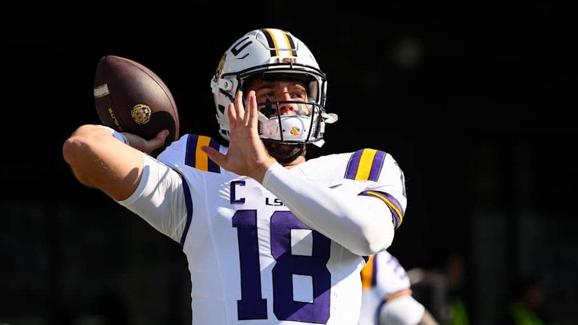  Oct 18, 2025; Nashville, Tennessee, USA; Louisiana State Tigers quarterback Garrett Nussmeier (18) against the Vanderbilt Commodores during pre-game warmups at FirstBank Stadium. Mandatory Credit: Steve Roberts-Imagn Images | Steve Roberts-Imagn Images 