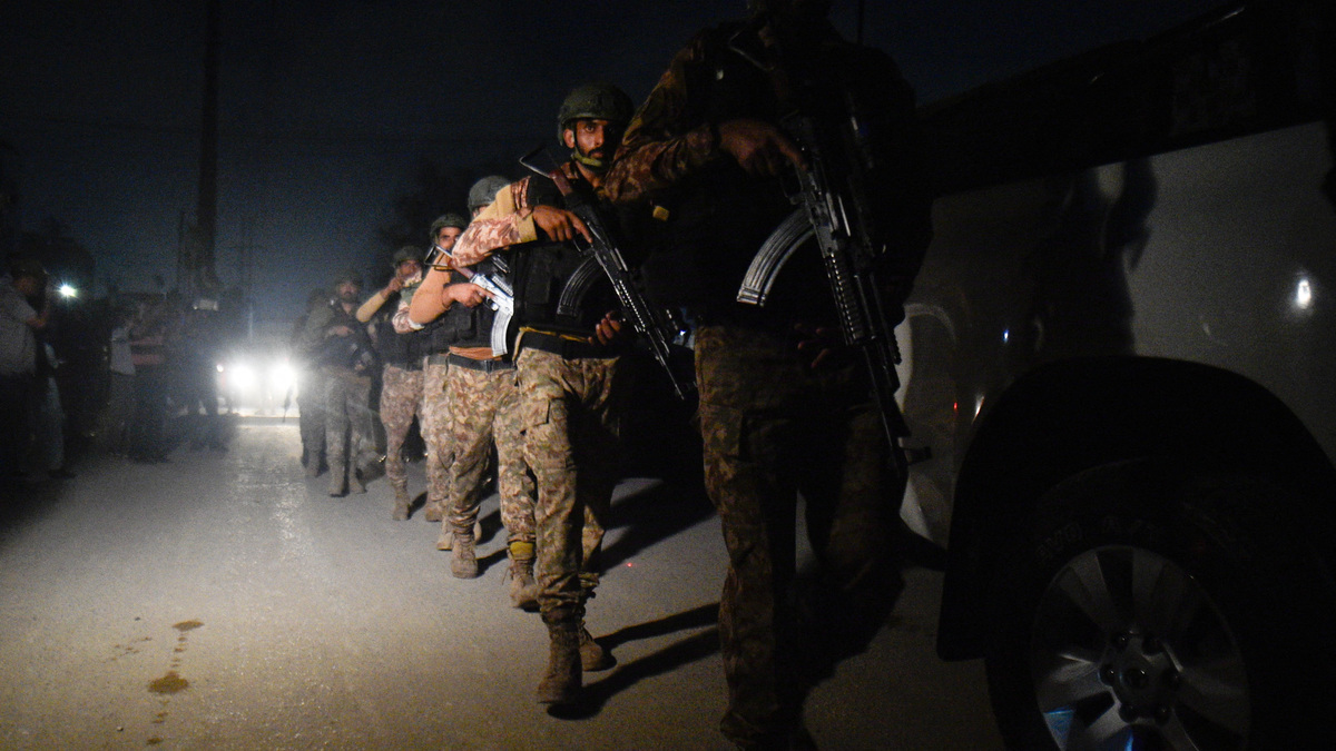 Security personnel patrols after an explosion and gunfire were reported, near offices of the Rangers, a paramilitary force, in Karachi, Pakistan, June 27, 2026. REUTERS/ Qaiser Khan