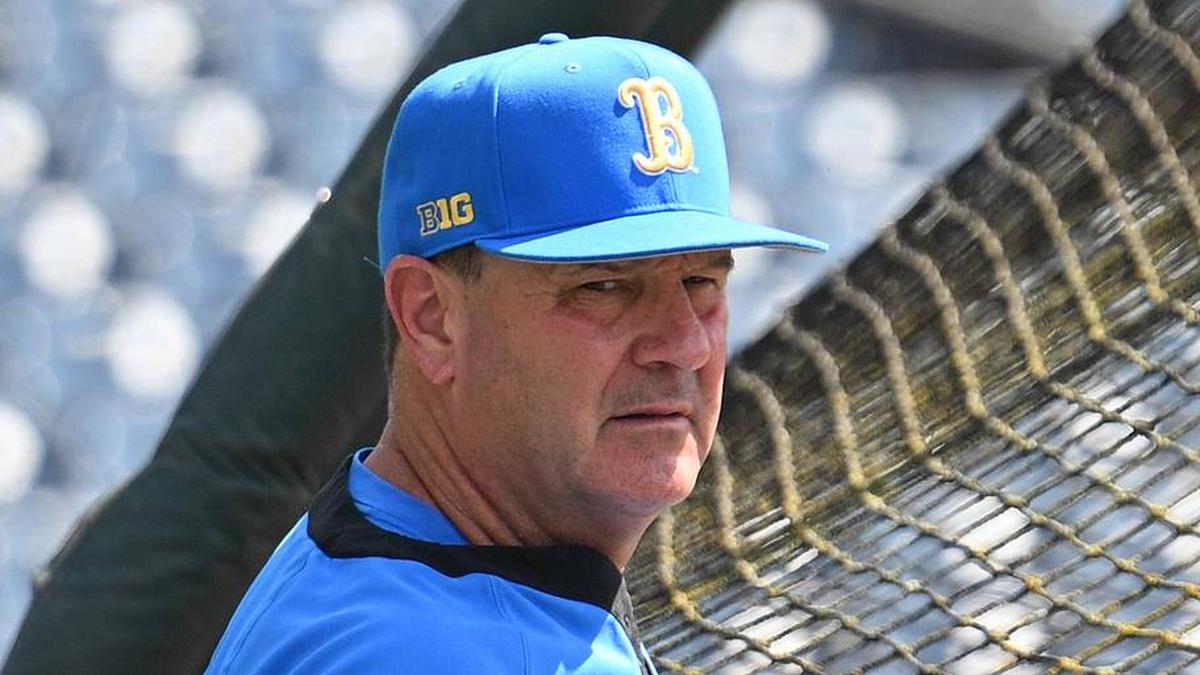  Jun 14, 2025; Omaha, Neb, USA; UCLA Bruins head coach John Savage watches the team warm up before the game against the Murray State Races at Charles Schwab Field. Mandatory Credit: Steven Branscombe-Imagn Images | Steven Branscombe-Imagn Images 
