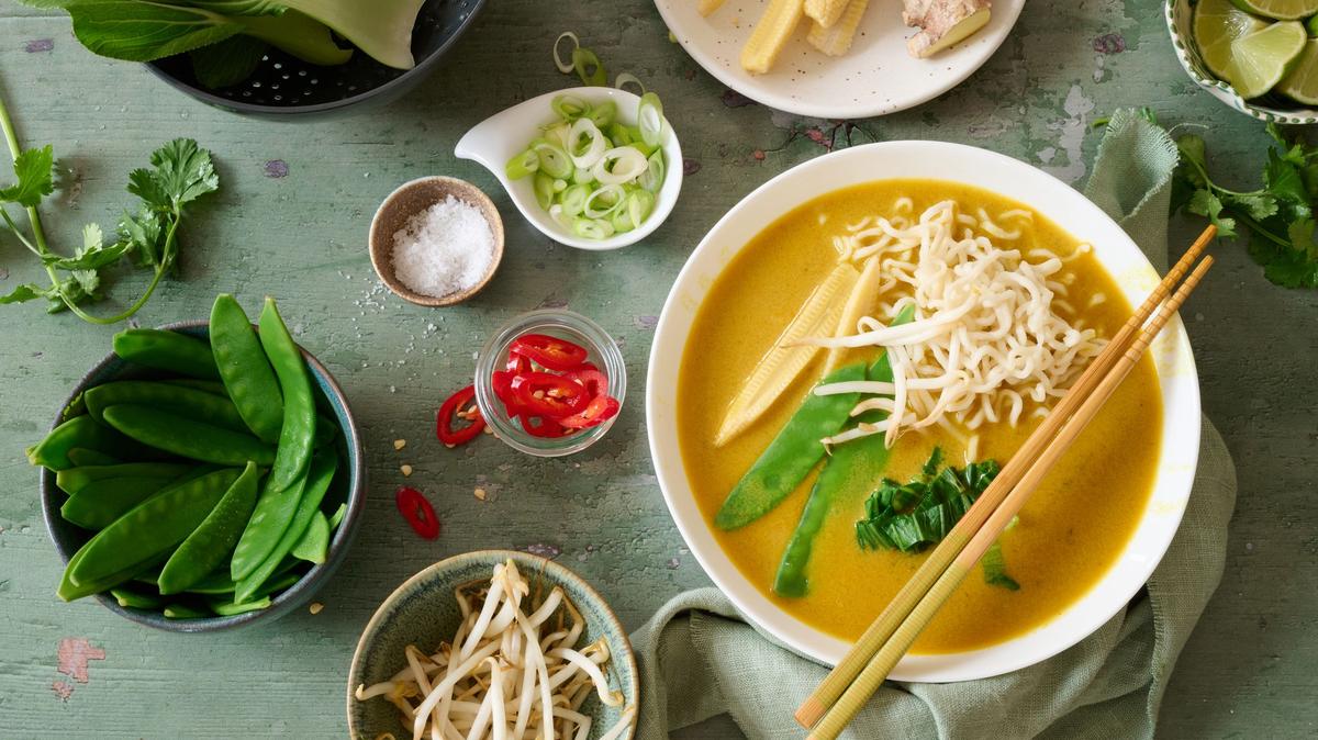 Bright yellow and crisp green meet coconut milk and baby corn in this Thai vegetable soup. )