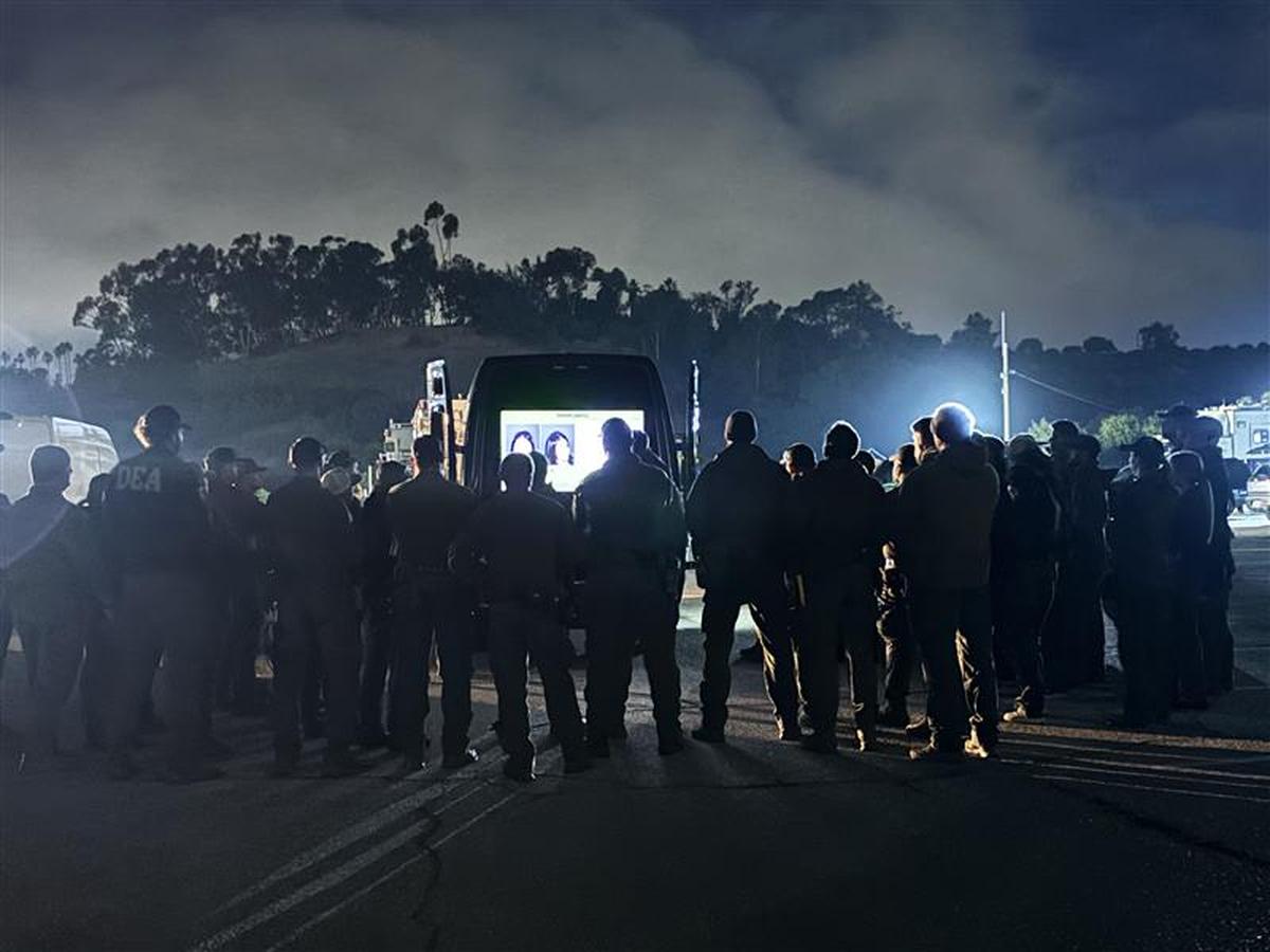  Law enforcement are seen preparing for a sweeping raid in Los Angeles, Wednesday, May 6, 2025. 