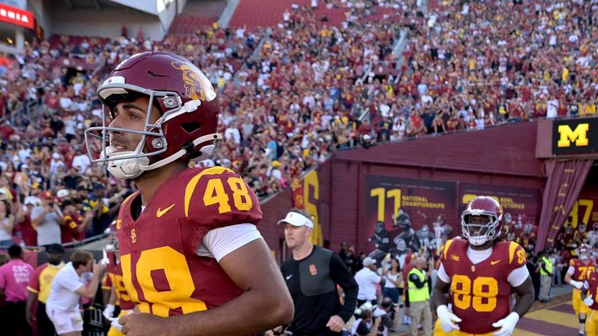  Oct 11, 2025; Los Angeles, California, USA; USC Trojans kicker Ryon Sayeri (48) heads on to the field for the game against the Michigan Wolverines at United Airlines Field at the Los Angeles Memorial Coliseum. Mandatory Credit: Jayne Kamin-Oncea-Imagn Images | Jayne Kamin-Oncea-Imagn Images 