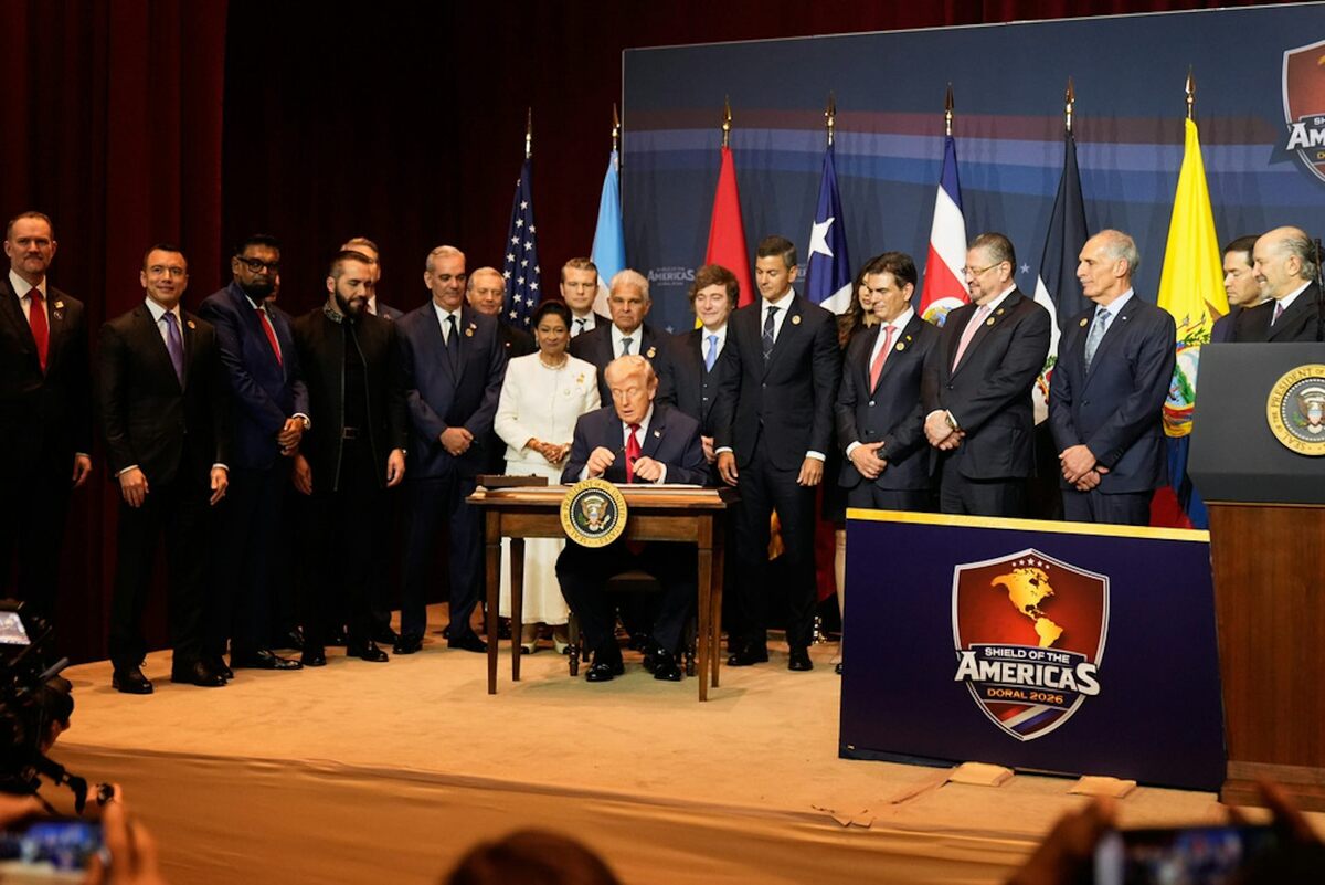  President Donald Trump signs a proclamation committing the U.S. to countering cartel criminal activity on March 7, 2026, in Doral, Fla. AP Photo / Mark Schiefelbein 