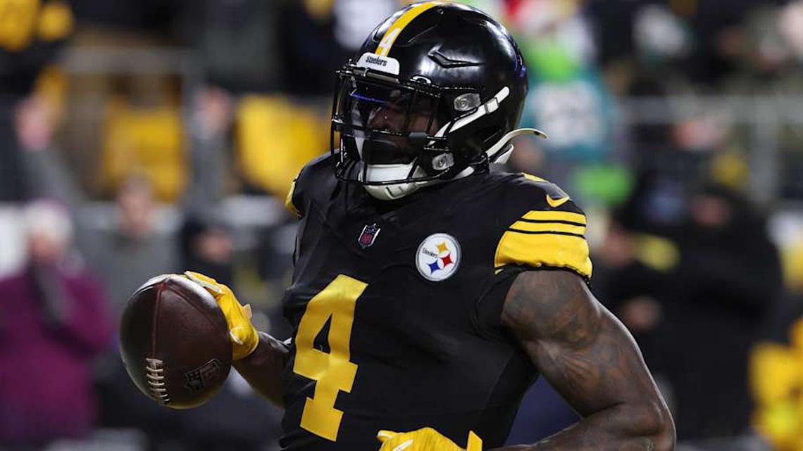  Dec 15, 2025; Pittsburgh, Pennsylvania, USA; Pittsburgh Steelers wide receiver DK Metcalf (4) scores a touchdown in the third quarter against the Miami Dolphins at Acrisure Stadium. | Charles LeClaire-Imagn Images 