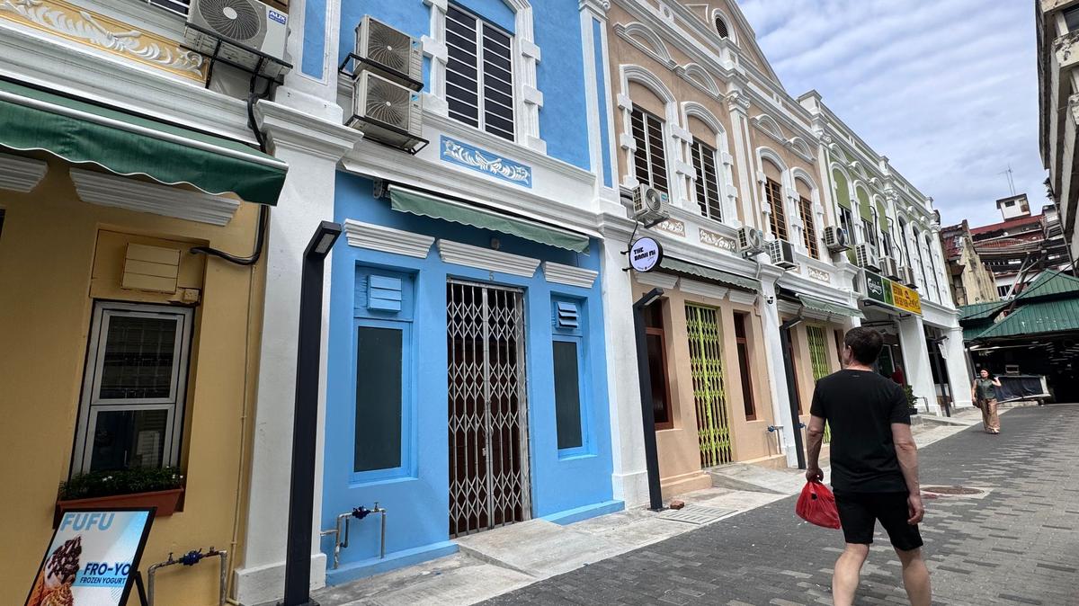 After years of restoration, the century-old commercial buildings on Jalan Sang Guna now shine in pastel colours. (Genevieve Tan Shu Thung/dpa/TNS)