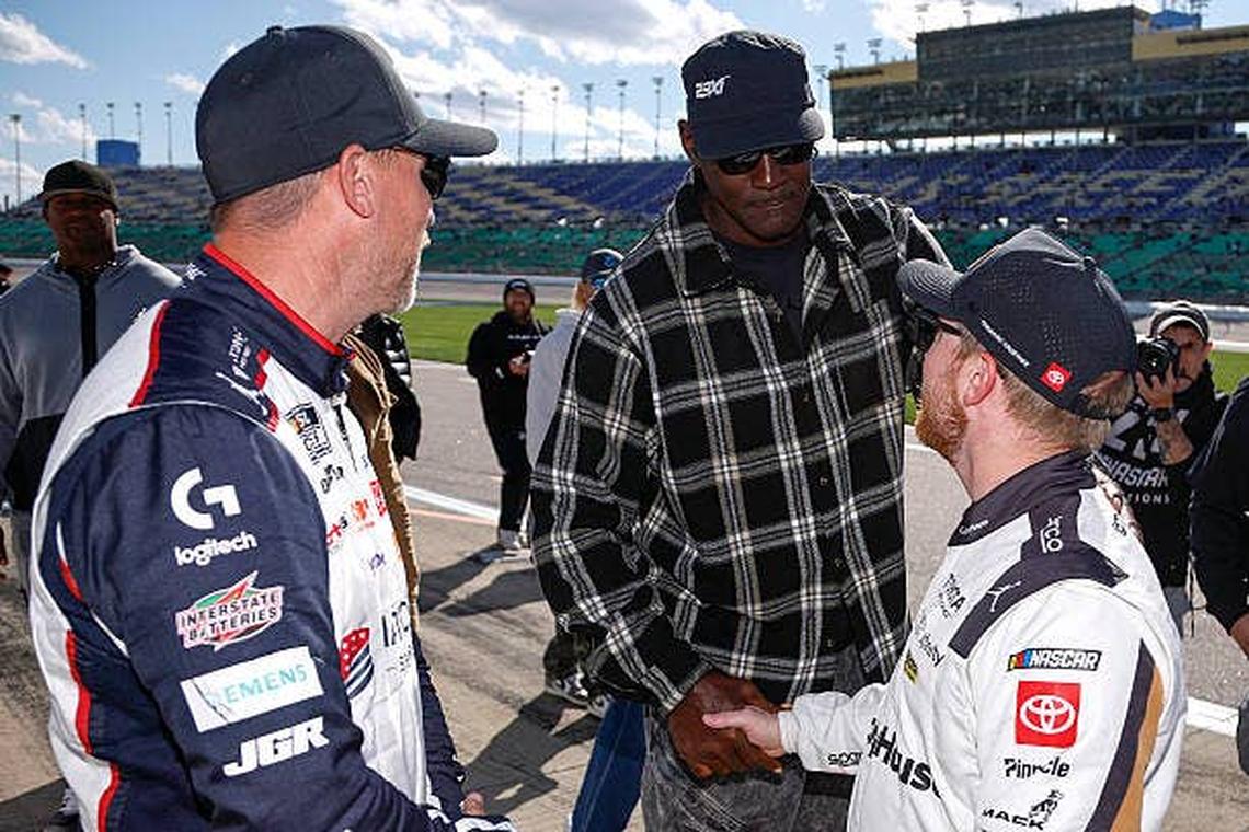  Michael Jordan and Denny Hamlin of 23XI Racing congratulate Tyler Reddick on winning. (Photo by Sean Gardner/Getty Images) Photo by Sean Gardner/Getty Images
