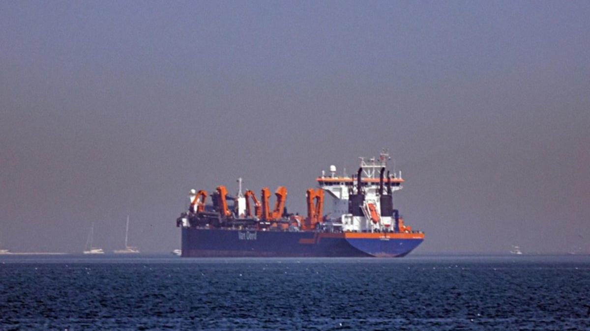 A vessel is seen anchoring off the coast of Dubai, United Arab Emirates, on March 1. The United Arab Emirates is planning to fasttrack construction of a West-East pipeline that would bypass the Strait of Hormuz, opening in 2027.