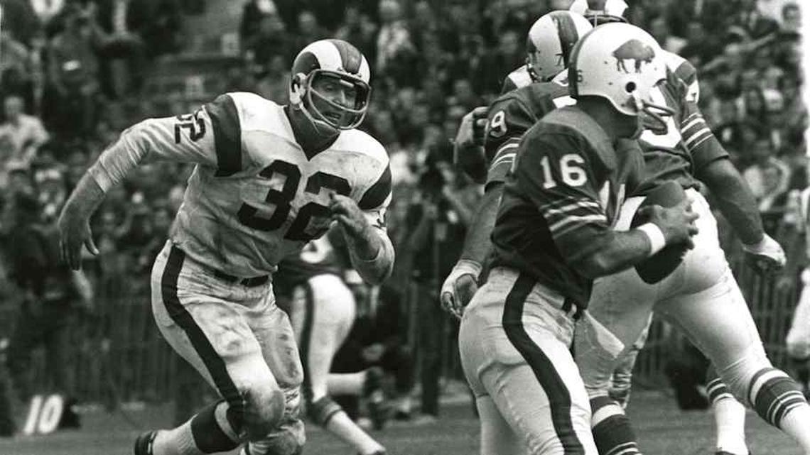  Sep 27, 1970; Buffalo, NY, USA; FILE PHOTO; Los Angles Rams linebacker Jack Pardee (32) chases Buffalo Bills quarterback dennis Shaw (16). The Rams beat the Bills 19-0. Pardee was one of the famed Junction boys, the 1954 Texas A&M preseason camp held in Junction ,Texas, by football coach Paul "Bear" Bryant. Mandatory Credit: Malcolm Emmons-Imagn Images | Malcolm Emmons-Imagn Images 