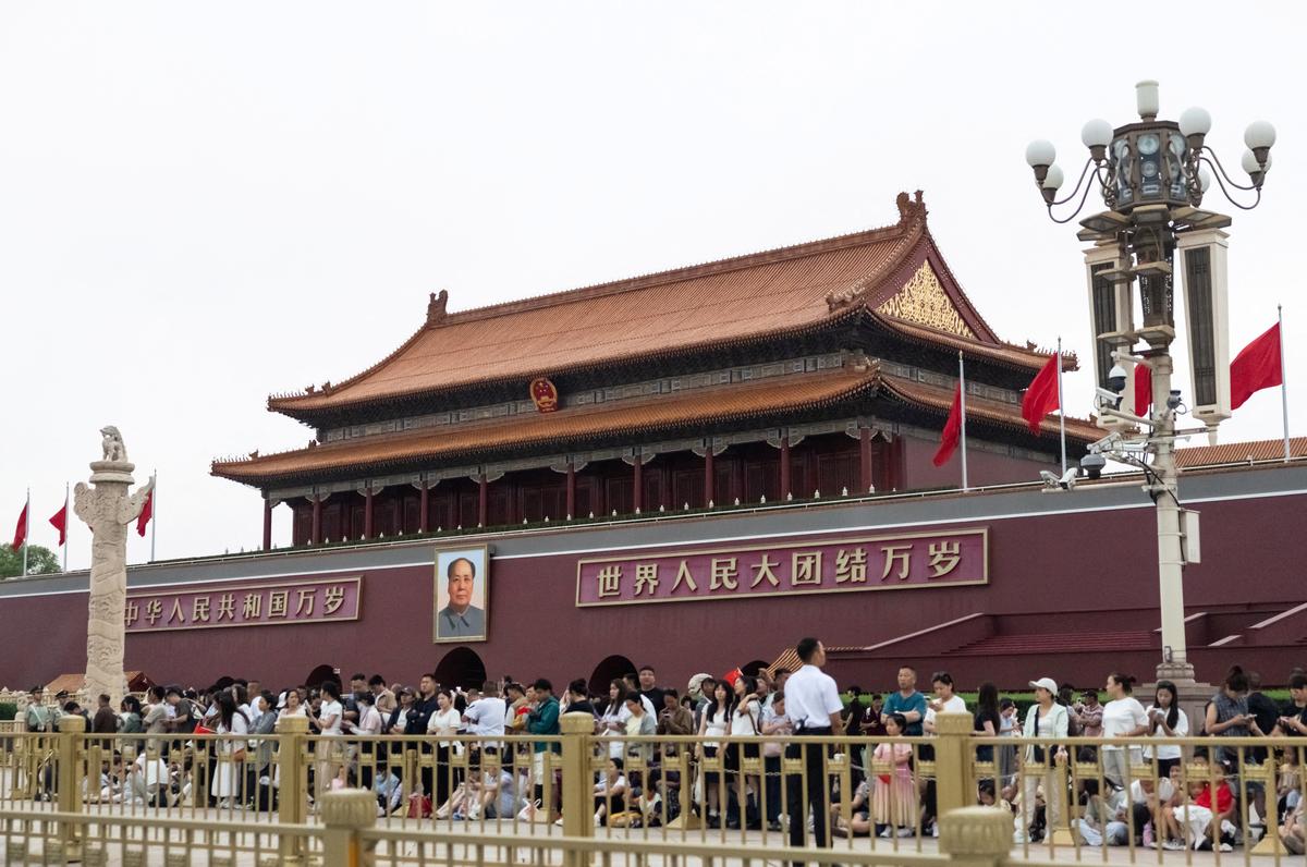 People gather next to Tiananmen Gate in Beijing, China, June 3, 2026. REUTERS/Maxim Shemetov