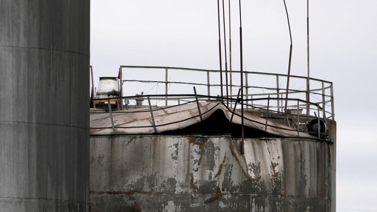 Damage to an oil tank after drones crashed at a storage facility in Rezekne, Latvia, May 7, 2026. REUTERS/Janis Laizans