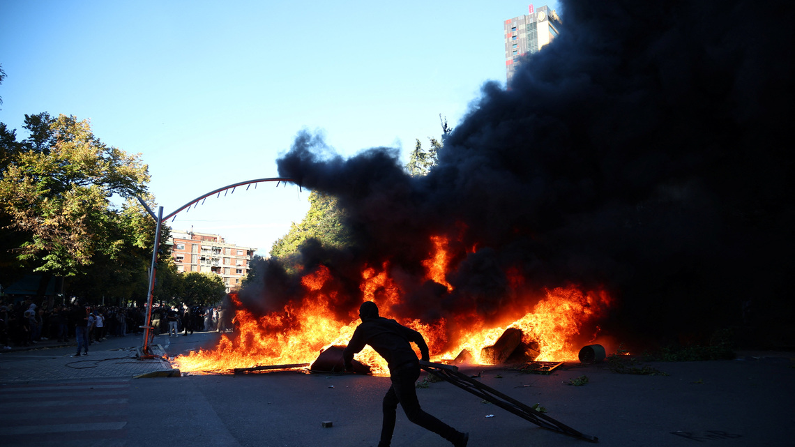 Albania's leader defies calls to resign as student protesters rampage in capital 