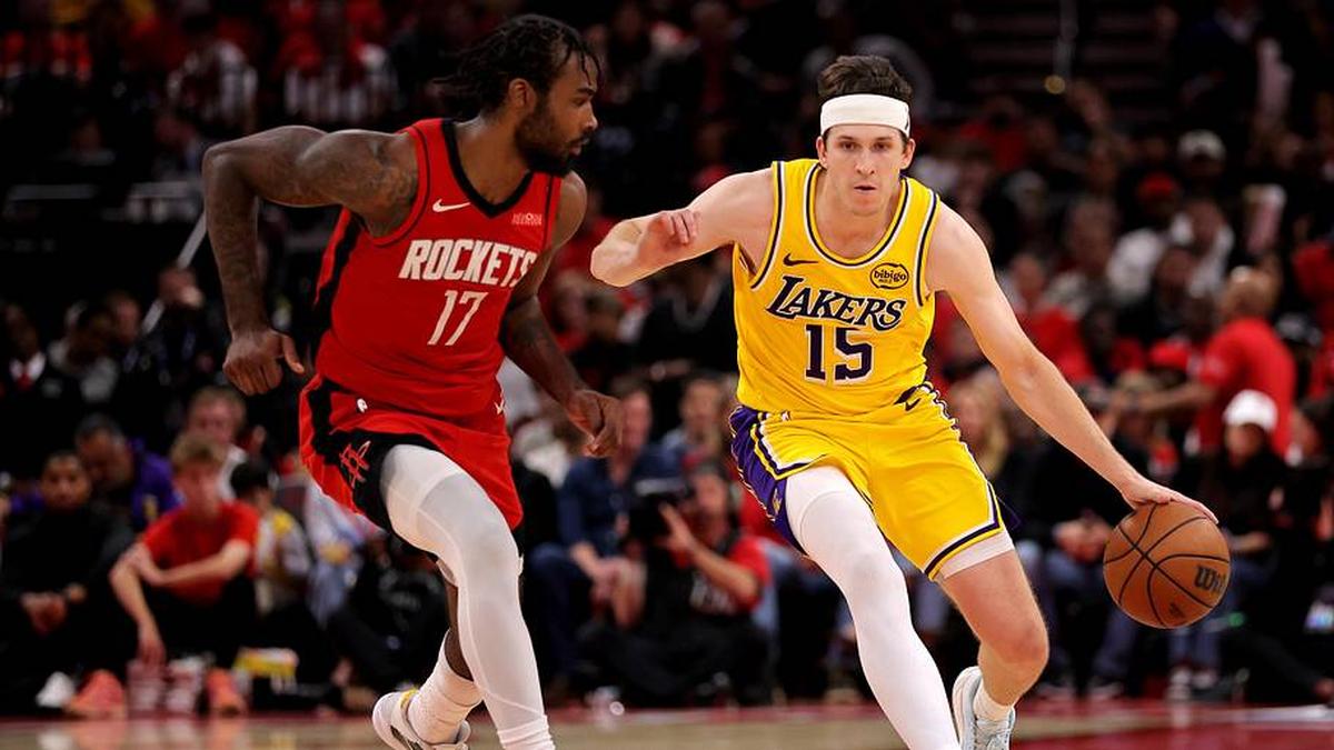  May 1, 2026; Houston, Texas, USA;Los Angeles Lakers guard Austin Reaves (15) handles the ball against Houston Rockets forward Tari Eason (17) during the third quarter of game six of the first round of the 2026 NBA Playoffs at Toyota Center. | Erik Williams-Imagn Images 