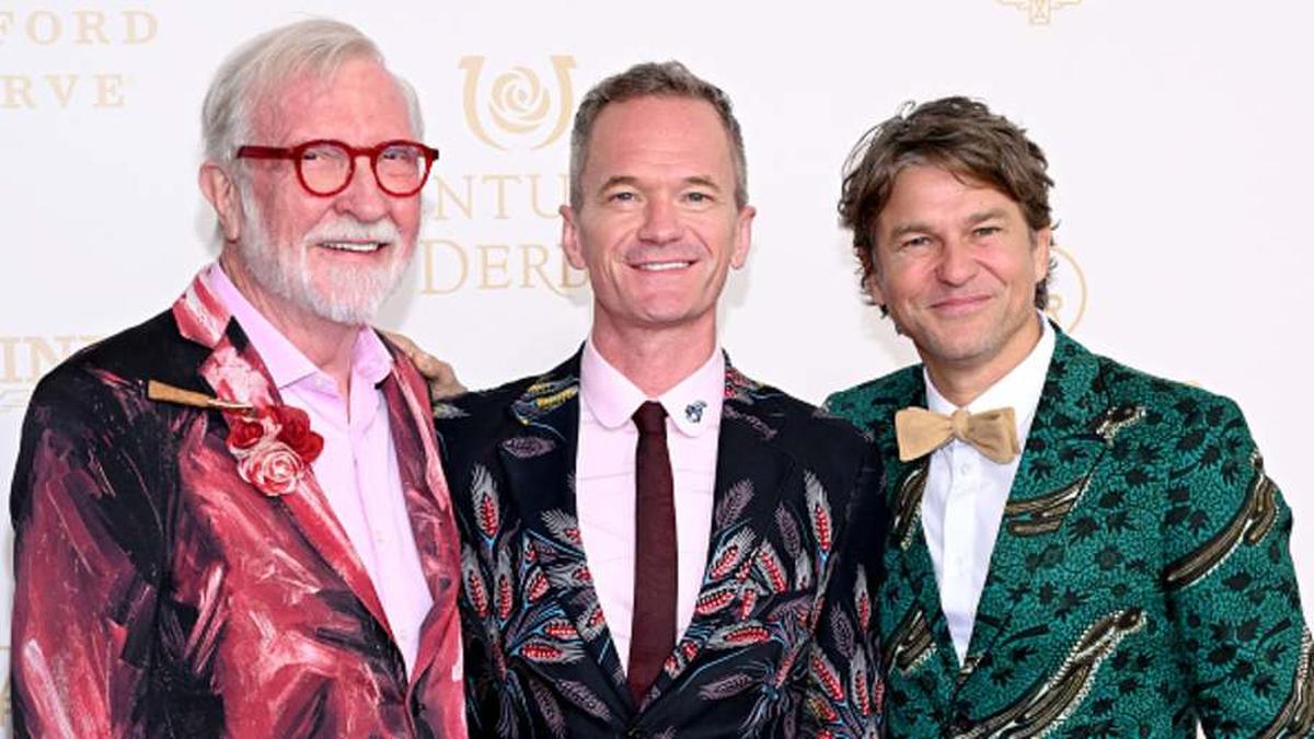  Neil Patrick Harris and his husband David Burtka (right) walk the red carpet at the 2026 Kentucky Derby. | Photo by Daniel Boczarski/Getty Images 