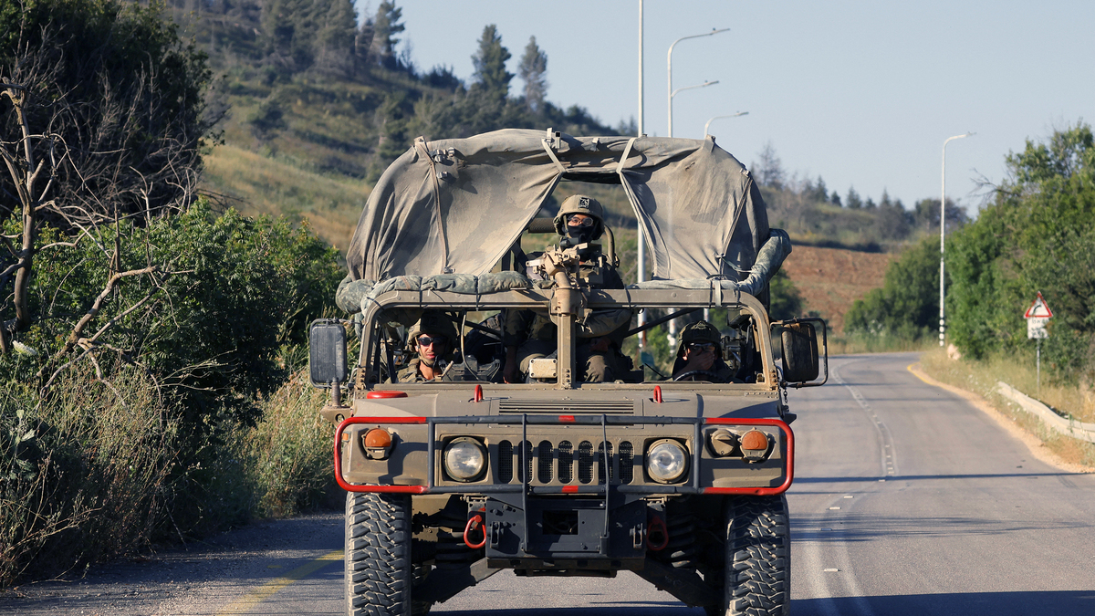 An Israeli army humvee vehicle patrols along the northern road near Moshav Margaliot in the Upper Galilee bordering Lebanon on June 9, 2026, after a shooting incident at IDF soldiers operating in the Ramim Ridge area. The Israeli army said on June 9 that its forces killed a gunman who had managed to infiltrate Israeli territory from Lebanon and opened fire on its troops. (Jalaa MareyAFP/Getty Images/TNS)