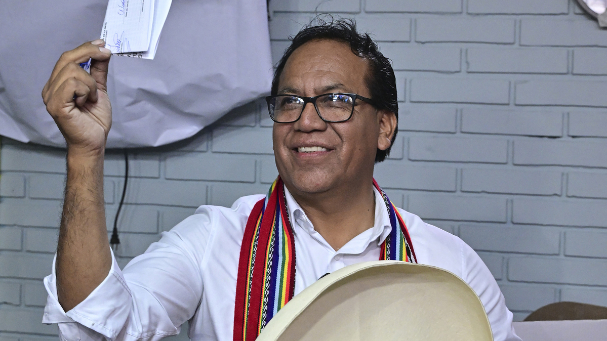 Peru's presidential candidate Roberto Sanchez, for the Juntos por el Peru party, prepares to cast his vote during the general election runoff, in Lima on June 7, 2026. Peruvians will choose their ninth president in 10 years in a tight runoff election between conservative Keiko Fujimori and leftist Roberto Sanchez, who are trying to woo voters fed up with political chaos and rising crime. (AFP via Getty Images/TNS)