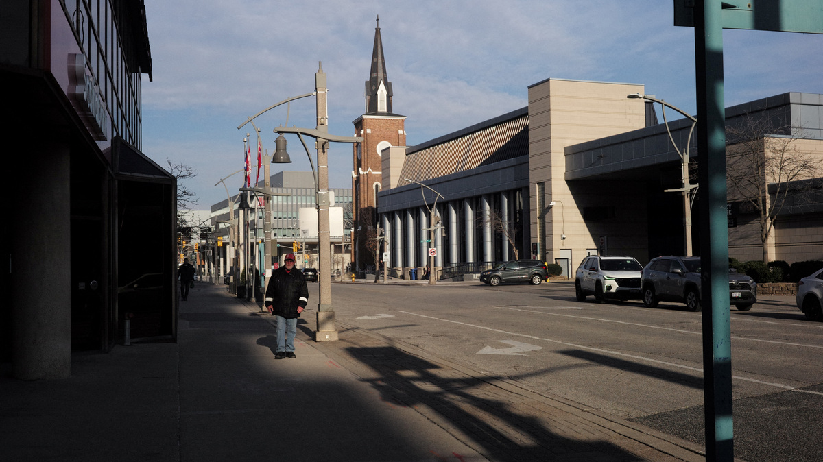People walk at the downtown bus station in Windsor, Ontario, Canada, March 19, 2026. REUTERS/Wa Lone