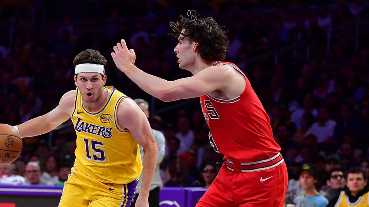  Mar 12, 2026; Los Angeles, California, USA; Los Angeles Lakers guard Austin Reaves (15) moves the ball against Chicago Bulls guard Josh Giddey (3) during the first half at Crypto.com Arena. Mandatory Credit: Gary A. Vasquez-Imagn Images | Gary A. Vasquez-Imagn Images 