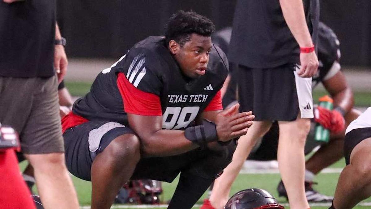  Texas Tech's Mateen Ibirogba goes through warmups during spring football practice, Thursday, March 26, 2026, at the Womble Football Center. | Nathan Giese/Avalanche-Journal / USA TODAY NETWORK via Imagn Images 