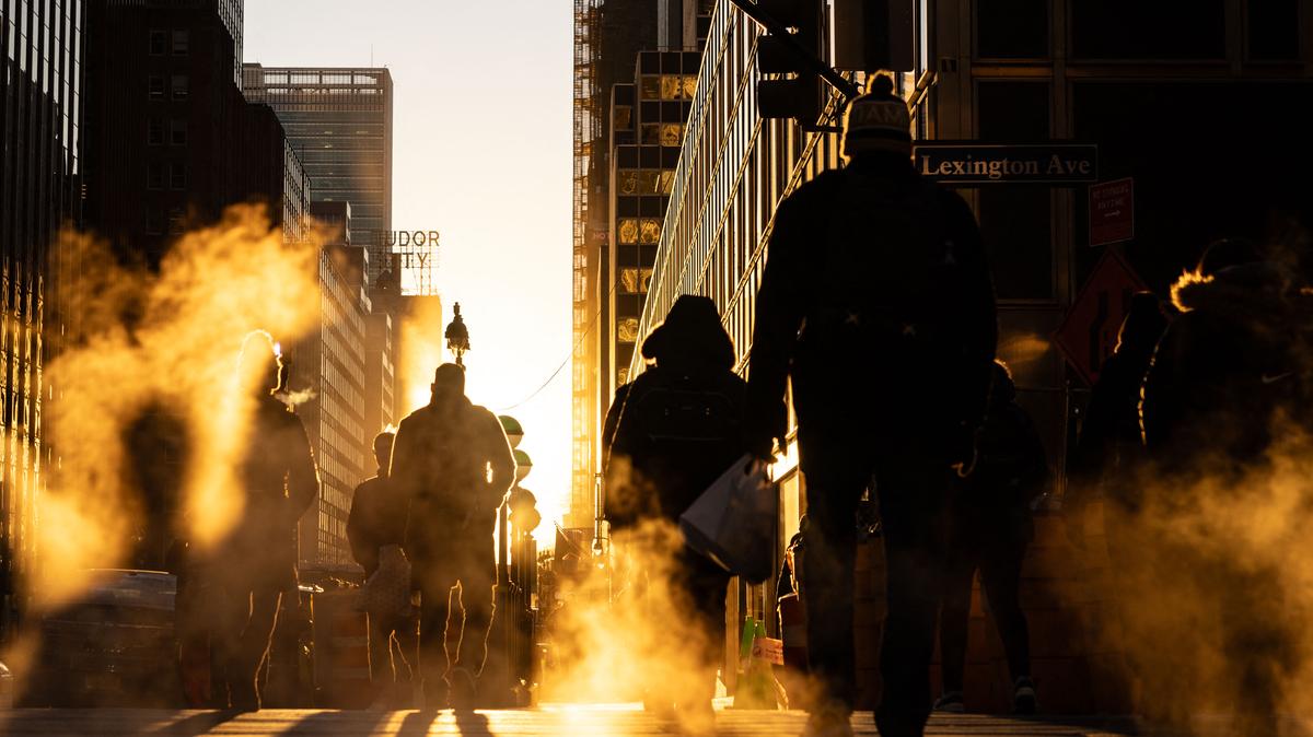 US-LIFESTYLE-NEW YORK. Morning commuters cross the street in the Manhattan borough of New York City on January 30, 2025.