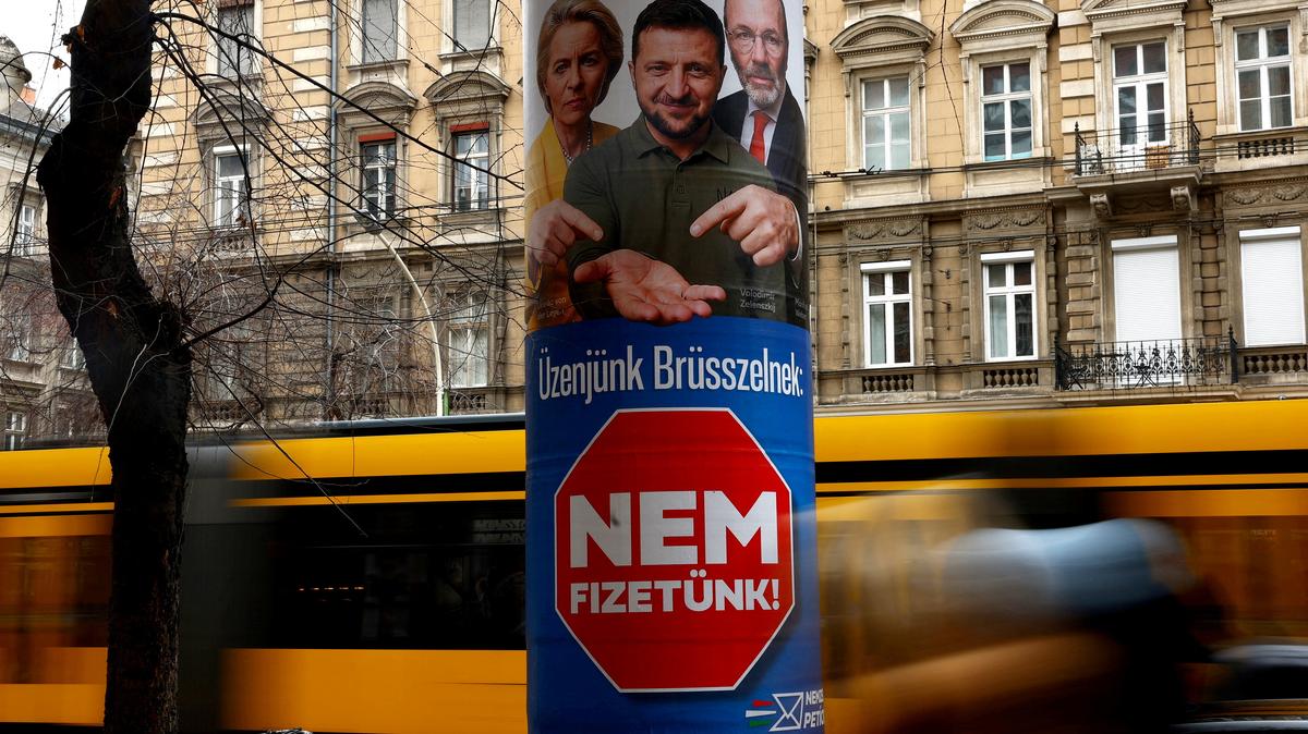 FILE PHOTO: A government election billboard shows European Commission President Ursula von der Leyen, Ukraine's President Volodymyr Zelenskiy and European People's Party (EPP) President Manfred Weber in Budapest, Hungary, February 11, 2026. The billboard reads: "Our message to Brussels is that we will not pay". REUTERS/Bernadett Szabo/File Photo