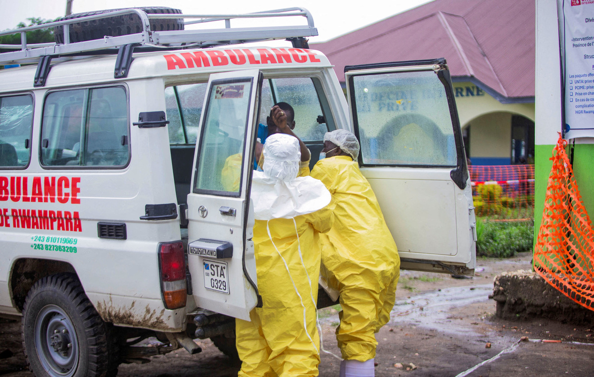 FILE PHOTO: Congolese health workers receive a patient at the Rwampara General Hospital as authorities intensify efforts to contain a new Ebola outbreak involving the Bundibugyo strain outbreak in Rwampara outside Bunia, Ituri province, Democratic Republic of Congo, May 21, 2026. REUTERS/Stringer/File Photo
