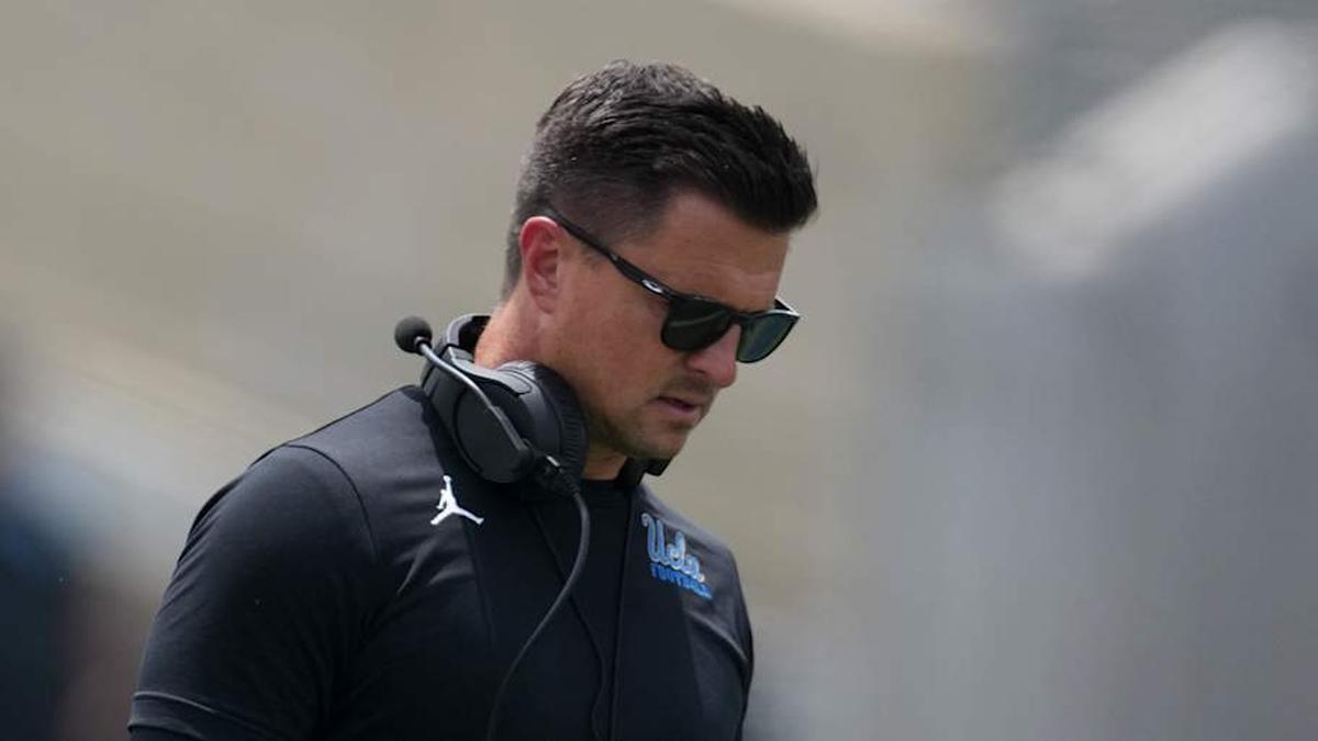  May 2, 2026; Pasadena, CA, USA; UCLA Bruins defensive coordinator Colin Hitschler (left) and head coach Bob Chesney during the spring game at Rose Bowl. Mandatory Credit: Kirby Lee-Imagn Images | Kirby Lee-Imagn Images 