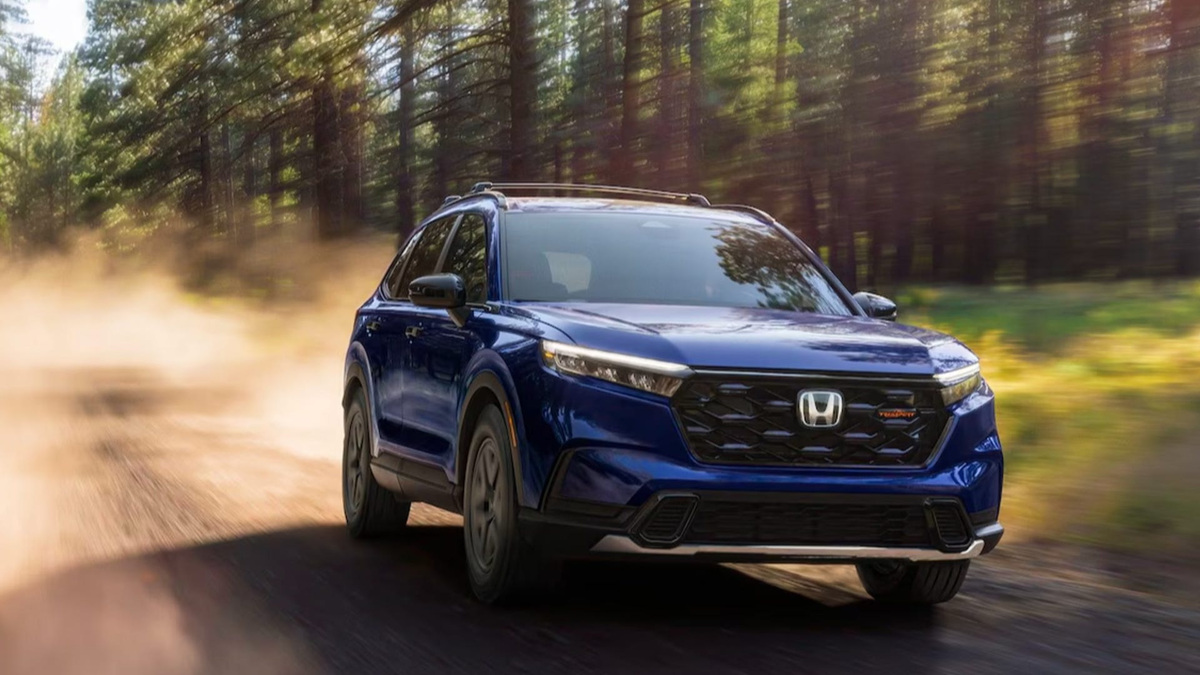 The 2026 Honda CR-V Hybrid is driving.