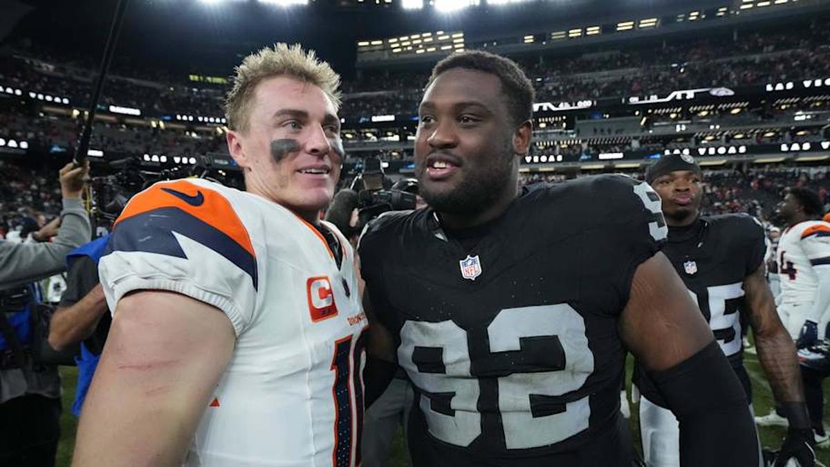  Dec 7, 2025; Paradise, Nevada, USA; Denver Broncos quarterback Bo Nix (10) and Las Vegas Raiders defensive tackle JJ Pegues (92) meet on the field following a game at Allegiant Stadium. Mandatory Credit: Kirby Lee-Imagn Images | Kirby Lee-Imagn Images 
