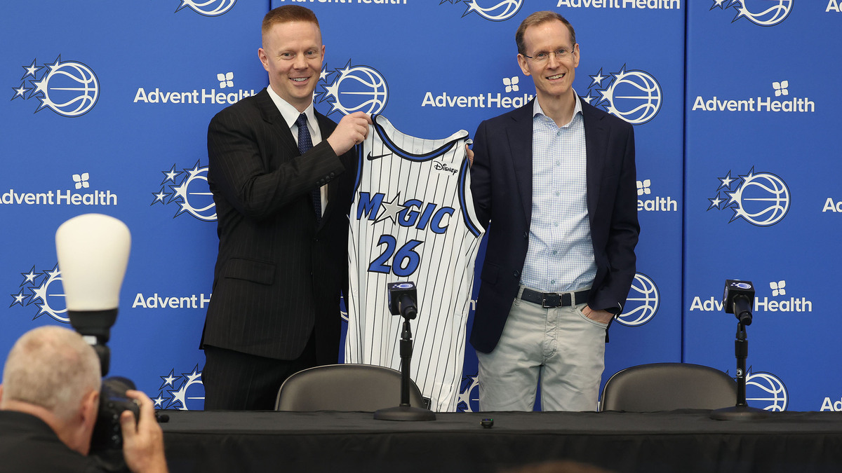 New Orlando Magic head coach Sean Sweeney, left, and Magic president Jeff Weltman are pictured during a press conference at the Orlando Magic AdventHealth Training Center in Orlando, Fla., on Thursday, June 18, 2026. (Stephen M. Dowell/Orlando Sentinel/TNS)