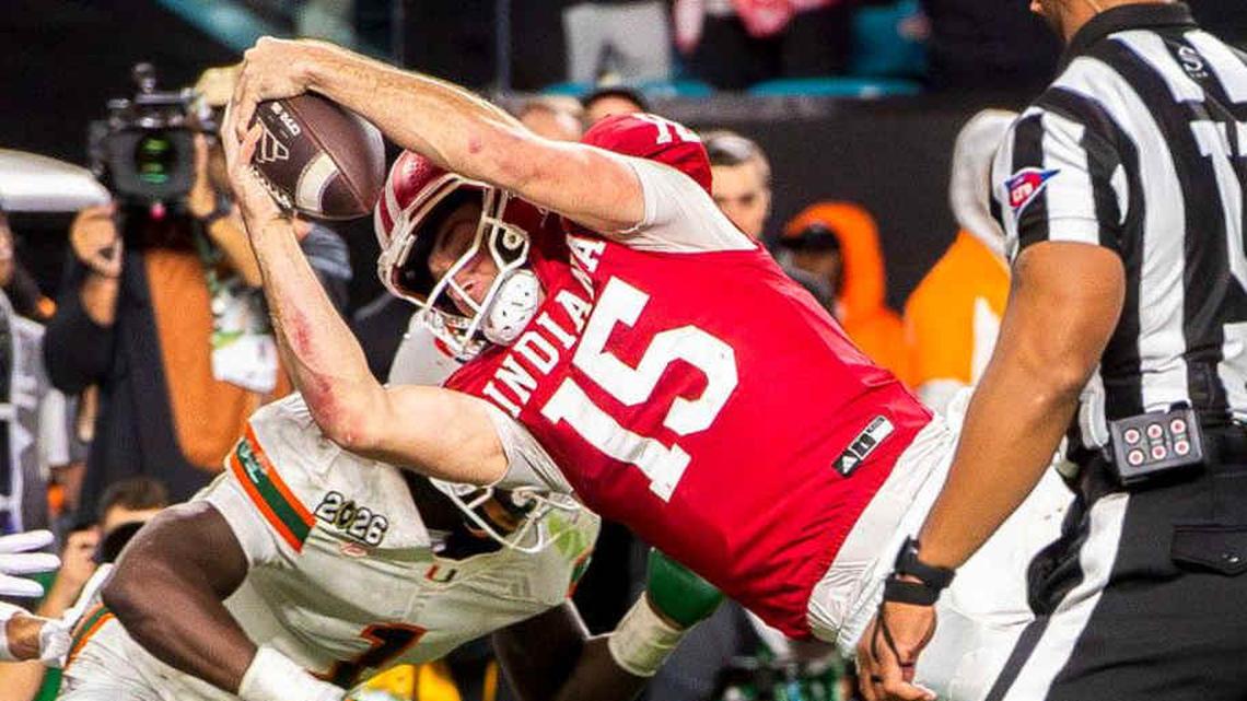  Indiana's Fernando Mendoza (15) scores a touchdown during the College Football Playoff National Championship college football game at Hard Rock Stadium in Miami Gardens on Monday, Jan. 19, 2026. | Rich Janzaruk/Herald-Times / USA TODAY NETWORK via Imagn Images 