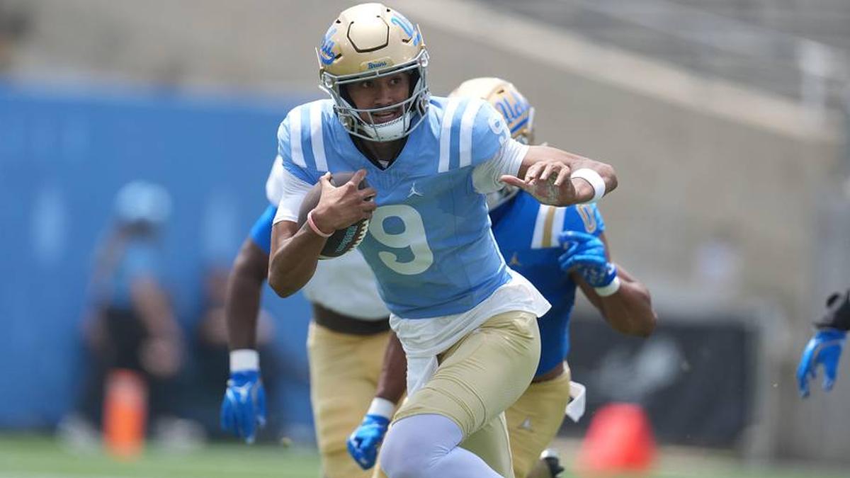 May 2, 2026; Pasadena, CA, USA; UCLA Bruins quarterback Nico Iamaleava (9) carries the ball during the spring game at Rose Bowl. Mandatory Credit: Kirby Lee-Imagn Images | Kirby Lee-Imagn Images 