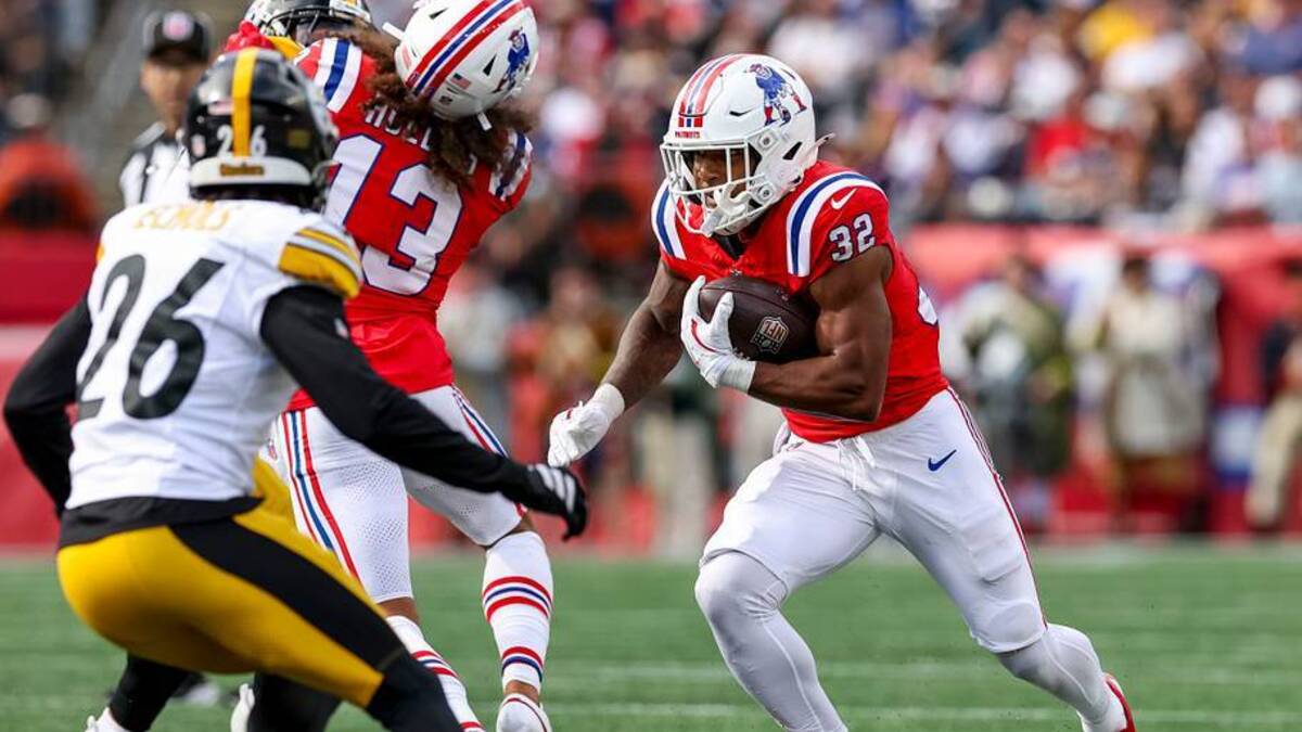  Sep 21, 2025; Foxborough, Massachusetts, USA; New England Patriots running back Treveyon Henderson (32) runs the ball during the third quarter at Gillette Stadium. Mandatory Credit: Paul Rutherford-Imagn Images | IMAGN IMAGES via Reuters Connect 