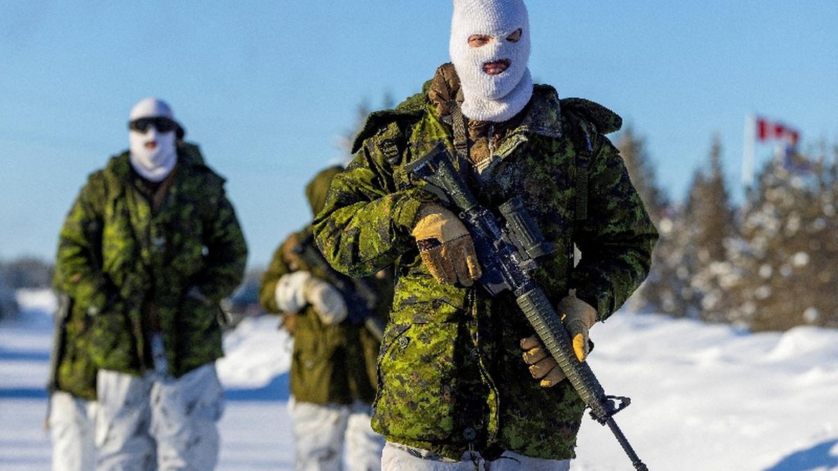 Members of the Loyal Edmonton Regiment as part of Task Force Grizzly participate in defensive operations around Edzo Airport as the Canadian Armed Forces deploy to "Operation Nanook-Nunalivut," a yearly series of drills designed to highlight the military's ability to defend the Canadian Arctic, in Behchoko, Northwest Territories, Canada, on Feb. 18.
