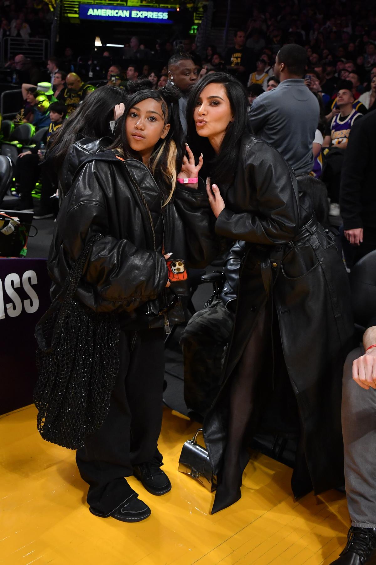 LOS ANGELES, CALIFORNIA - APRIL 09: Kim Kardashian (R) and North West attend a basketball game between the Los Angeles Lakers and the Golden State Warriors at Crypto.com Arena on April 09, 2024 in Los Angeles, California. NOTE TO USER: User expressly acknowledges and agrees that, by downloading and or using this photograph, User is consenting to the terms and conditions of the Getty Images License Agreement. (Photo by Allen Berezovsky/Getty Images)