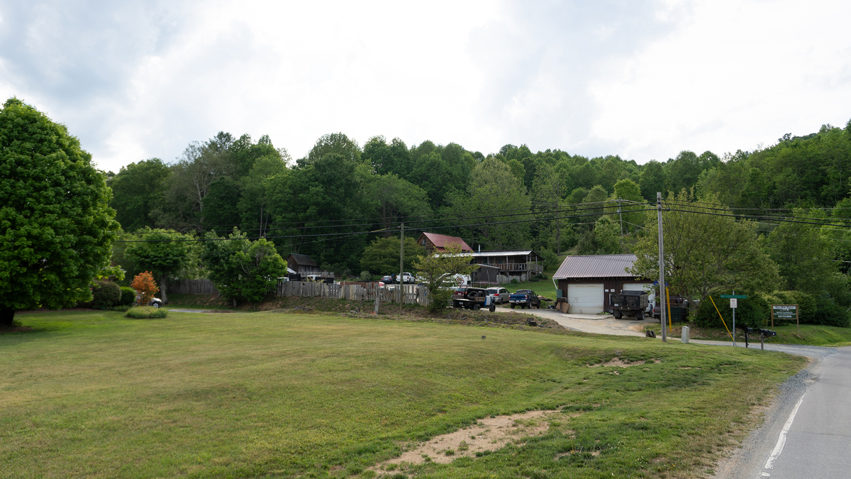 Rebecca and Ross Tobiassen built their home and Ross’ shop on their property in the western North Carolina mountains. They work and live there with their two teenage daughters. (Andrew Jones/KFF Health News/TNS)