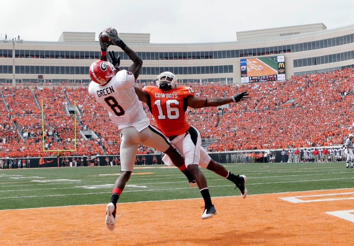  Oklahoma State wide receiver Perry Watson defends a pass intended for Georgia wide receiver A.J. Green at Boone Pickens Stadium. Brett Davis-USA TODAY Sports