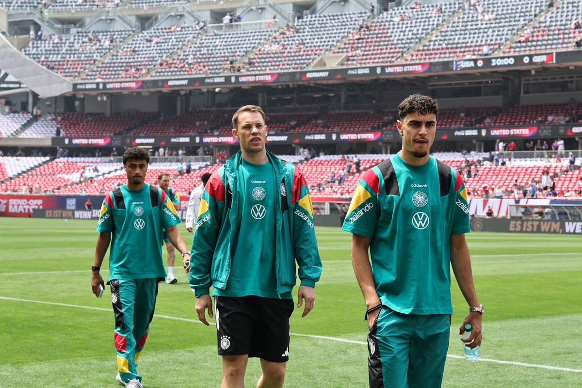  Aleksander Pavlovic and Manuel Neuer of Germany inspect the pitch prior to the international friendly match between United States and Germany at Soldier Field on June 06, 2026 in Chicago, Illinois. (Photo by Omar Vega/USSF/Getty Images) Photo by Omar Vega/USSF/Getty Images
