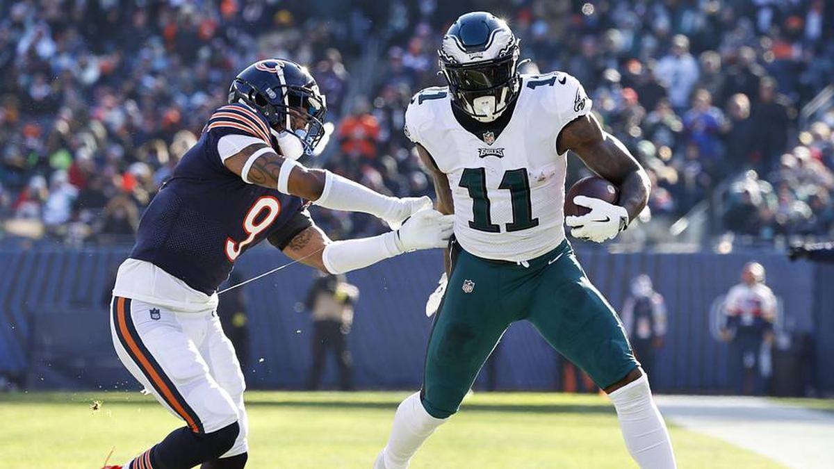 Dec 18, 2022; Chicago, Illinois, USA; Philadelphia Eagles wide receiver A.J. Brown (11) runs the ball after a catch on Chicago Bears safety Jaquan Brisker (9) during the second quarter at Soldier Field. Mandatory Credit: Mike Dinovo-Imagn Images | Mike Dinovo-Imagn Images 
