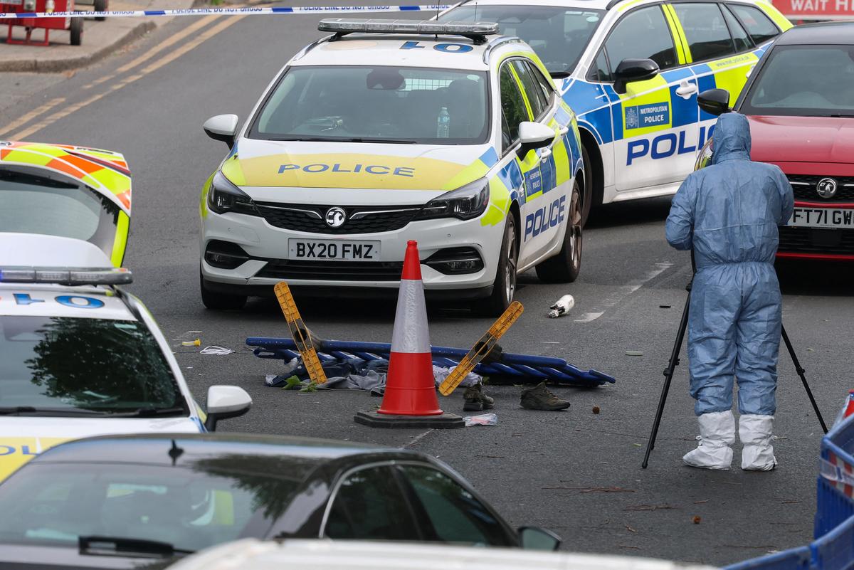 A member of the forensic team works at the scene, after a man was arrested following a stabbing incident in the Golders Green area, which is home to a large Jewish population, in London, Britain, April 29, 2026. REUTERS/Hannah McKay