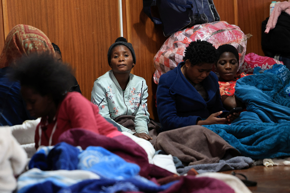 Displaced migrants shelter in a hall, following an escalation in anti-immigrant protests which heightened fears among foreign communities, in Kleinmond, South Africa, June 3, 2026. REUTERS/Esa Alexander