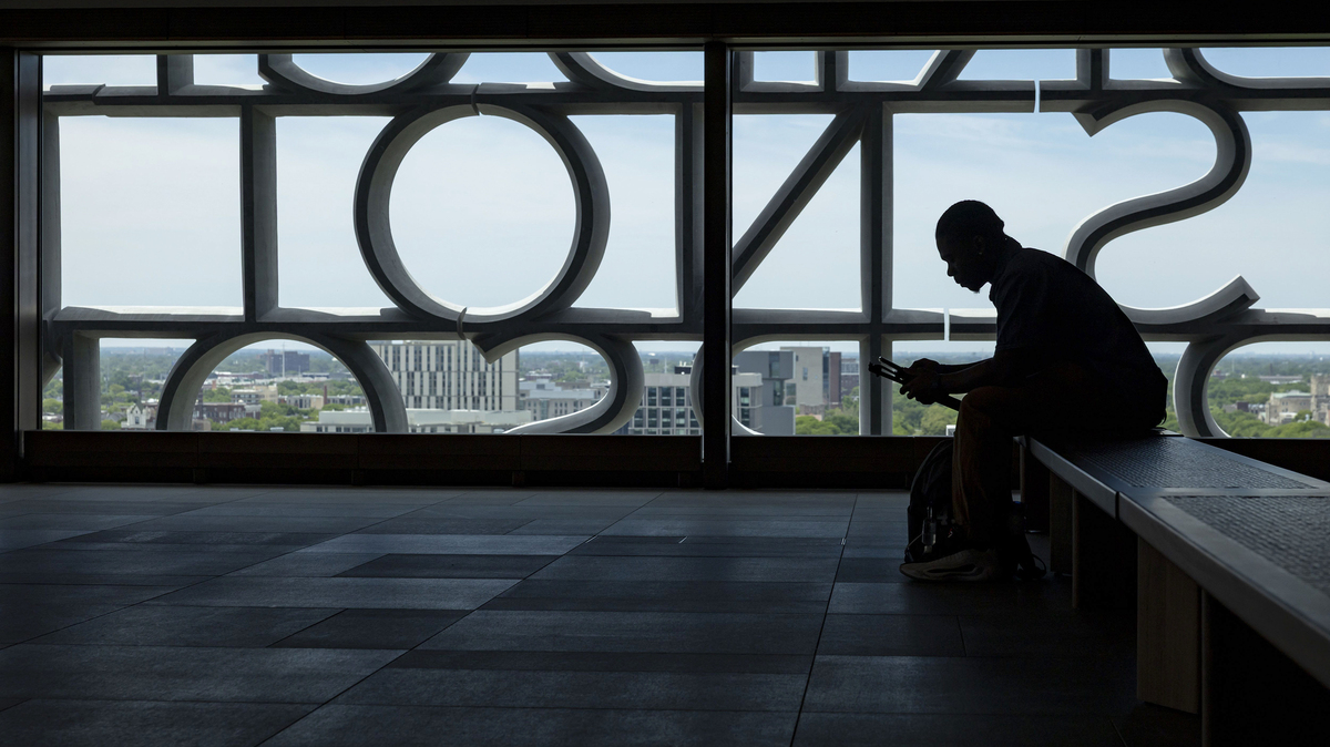 A visitor sits in the Sky Room as the Obama Presidential Center prepares for opening, June 3, 2026, in Chicago's Jackson Park. (Brian Cassella/Chicago Tribune/TNS)
