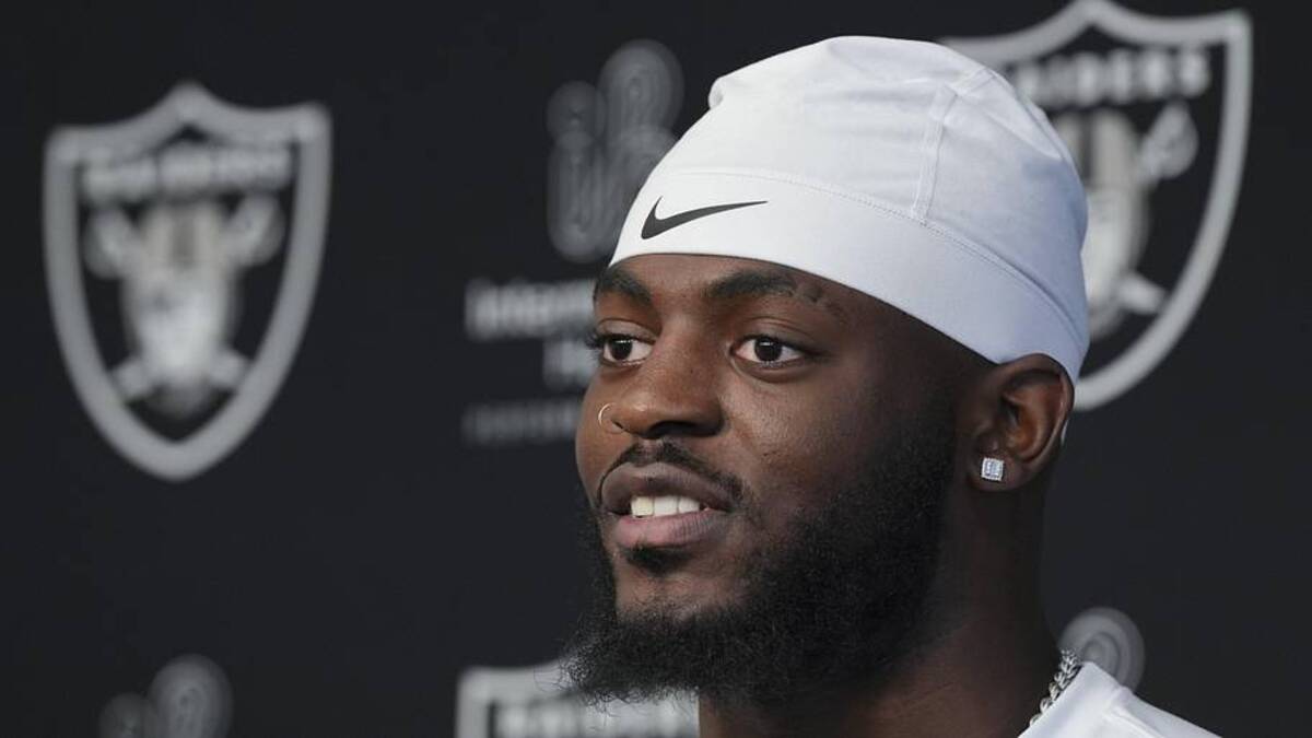  May 2, 2026; Henderson, NV, USA; Las Vegas Raiders defensive end Keyron Crawford (42) speaks during a news conference at the team's Rookie Minicamp at Intermountain Health Performance Center. Mandatory Credit: Candice Ward-Imagn Images | Candice Ward-Imagn Images 